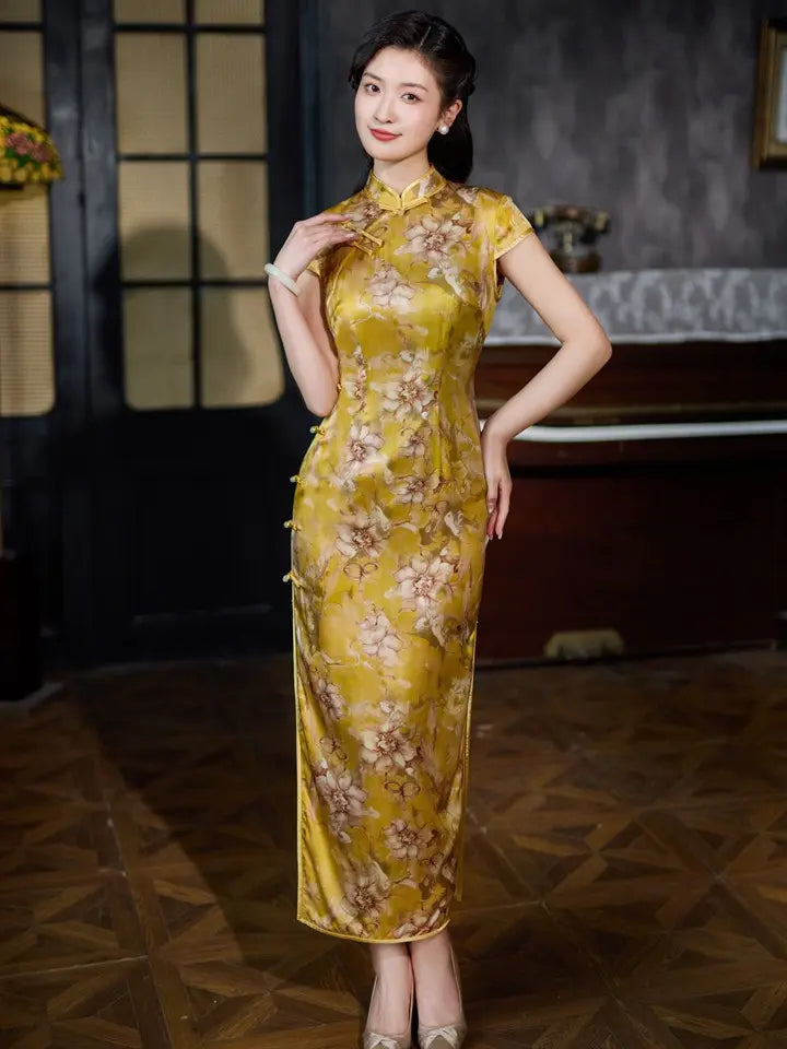 Woman wearing a yellow floral Vintage Gold Mulberry Silk Chinese Long Qipao Dress in an indoor setting