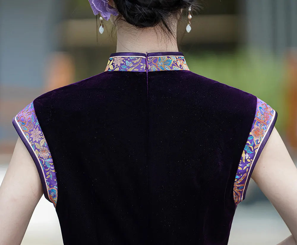 Purple traditional  chinese outfit with floral patterns on a blurred background