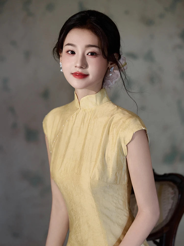 Woman in a Yellow Floral Sleeveless Midi Cheongsam Qipao Dress with a floral background