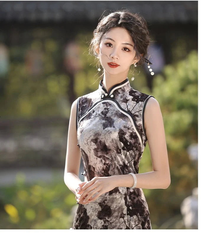 Woman wearing a traditional black  and white Floral Sleeveless Velvet Qipao cheongsam Dress with a blurred outdoor background