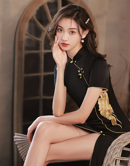  girl in black modern qipao dress. Featuring a peony flower embroidery on the waist , traditional mandarin collar, front side side slit and sitting on a chair