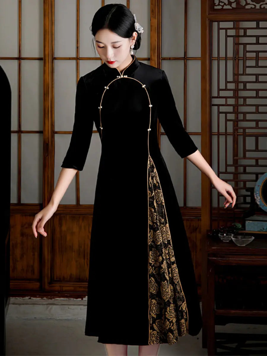 Woman wearing a black Velvet A line Qipao with Faux Pearl Buttons floral patterns in a traditional setting