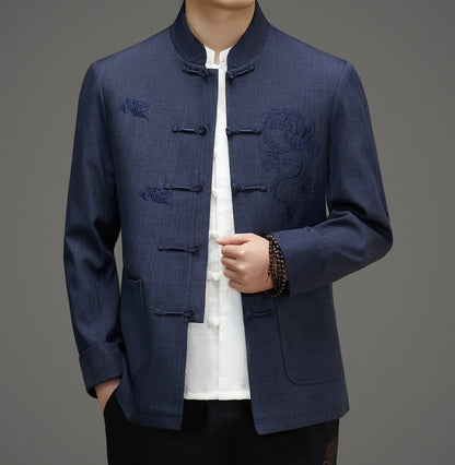 A men in blue tang jacket with dragon and cloud embroidery 