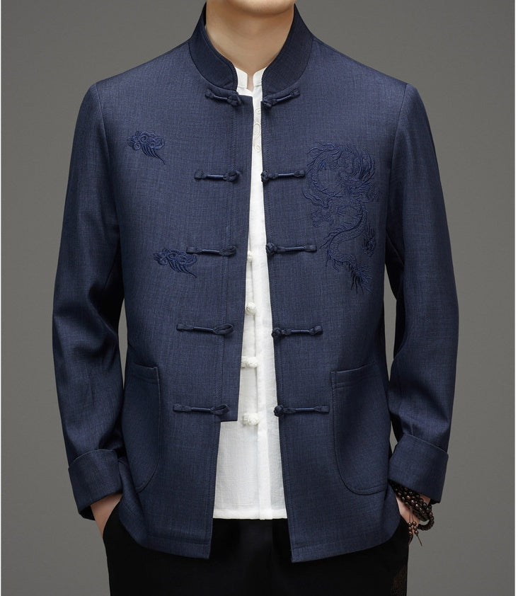 A men in blue tang jacket with dragon and cloud embroidery 
