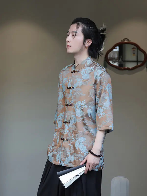 Person wearing a blue Modern Chinese Dragon Print Ice Silk Half Sleeve Tang Shirt  with a blurred background