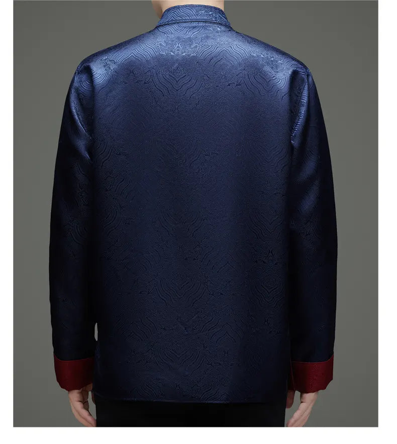 blue red Reversible Men’s Tang Jacket – Double-Sided Brocade Mandarin Coat  with red cuffs on a gray background