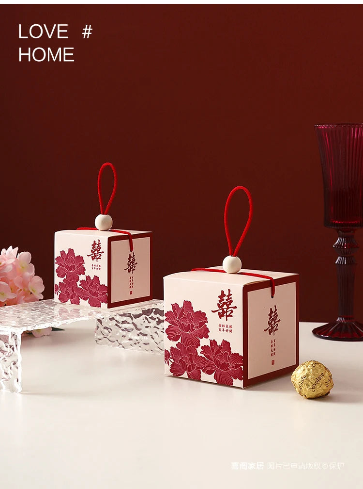 Chinese wedding favor boxes with red double happiness symbol, and peony flower