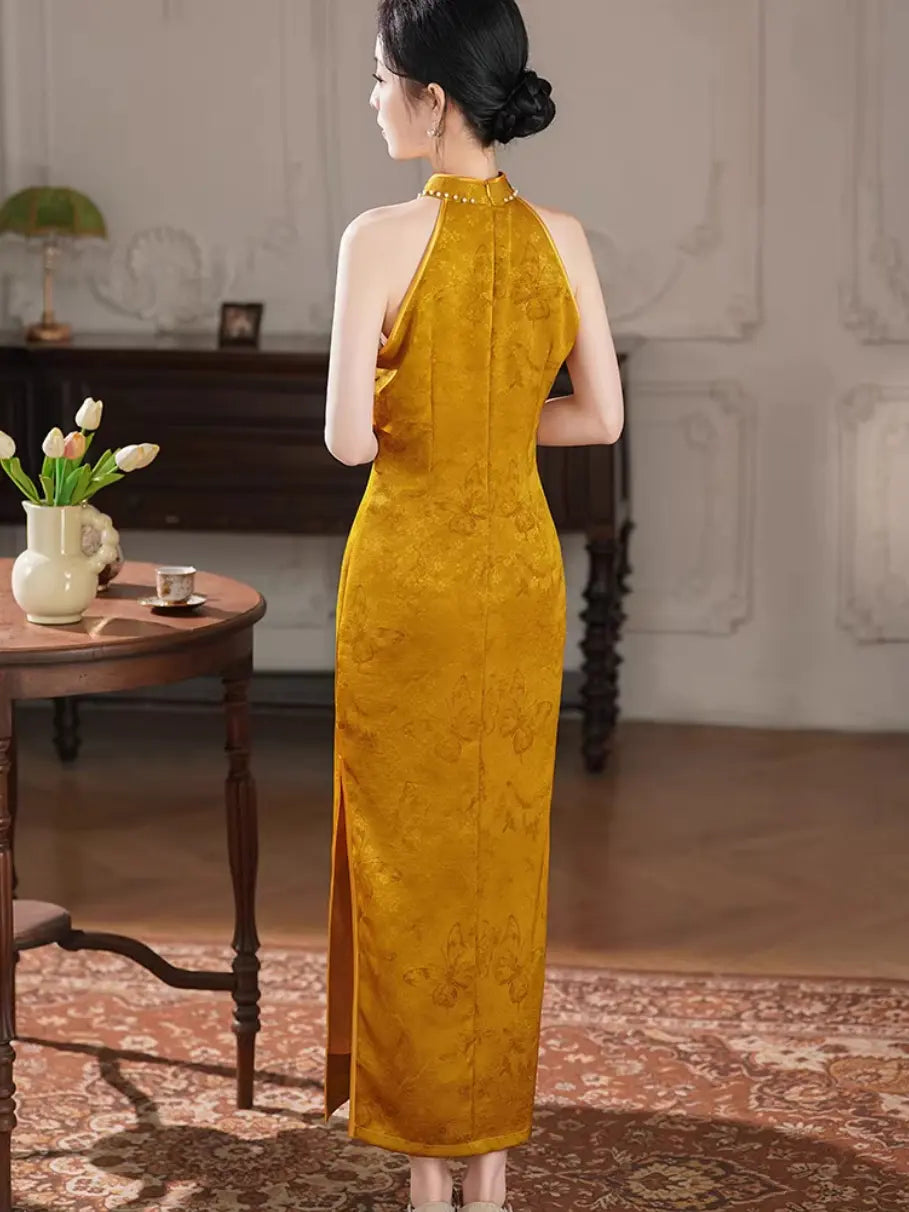 woman in a golden Pearl-Trimmed Sleeveless Halter Jacquard Satin Qipao cheongsam dress