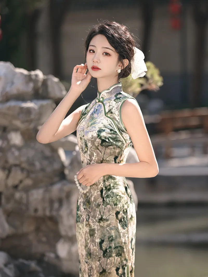 Woman in a traditional green  Floral Sleeveless Velvet chinese  Qipao Dress  standing outdoors with blurred background