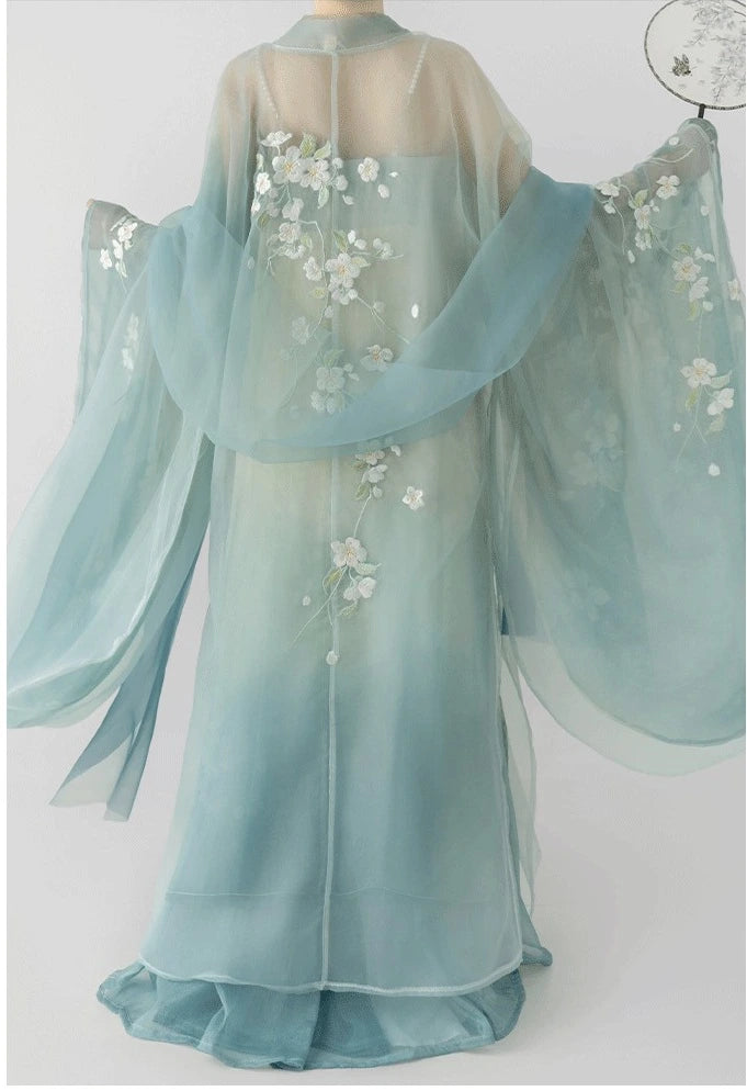 green Floral Traditional Chinese Tang Dynasty Hanfu Dress   traditional garment with floral embroidery on a white background
