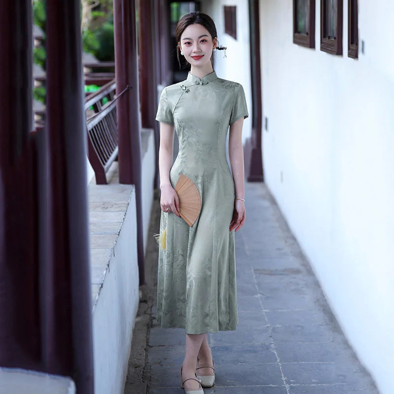 Woman in a green Modern Ao Dai Style Floral Jacquard A-Line Qipao dress standing in a traditional Chinese setting