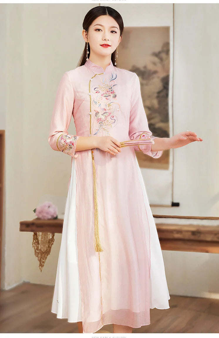 Woman wearing a traditional pink Ao Dai Style Qipao Dres – A-Line Long Cheongsam  with floral embroidery in a room setting.