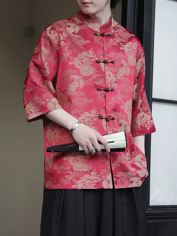 Person wearing a Modern Chinese Dragon Print Ice Silk Half Sleeve Tang Shirt jacket holding a clutch.