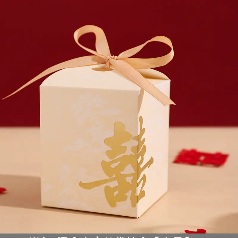 White Gold Foil Double Happiness Chinoiserie Wedding Favor Boxes   with gold double happiness symbol and pink ribbon on a red background